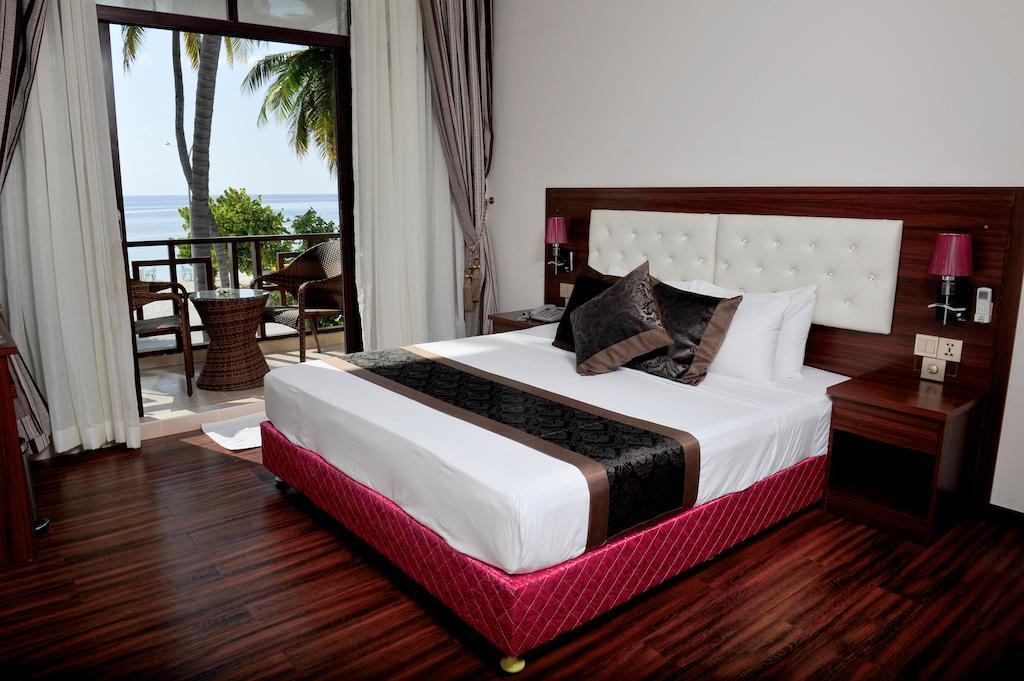 Sun Tan Beach Hotel Maafushi Rum bild