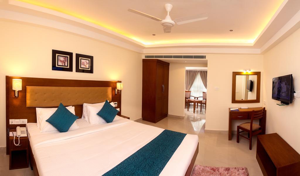 Hotel Vishnu Inn Guruvāyūr Rum bild