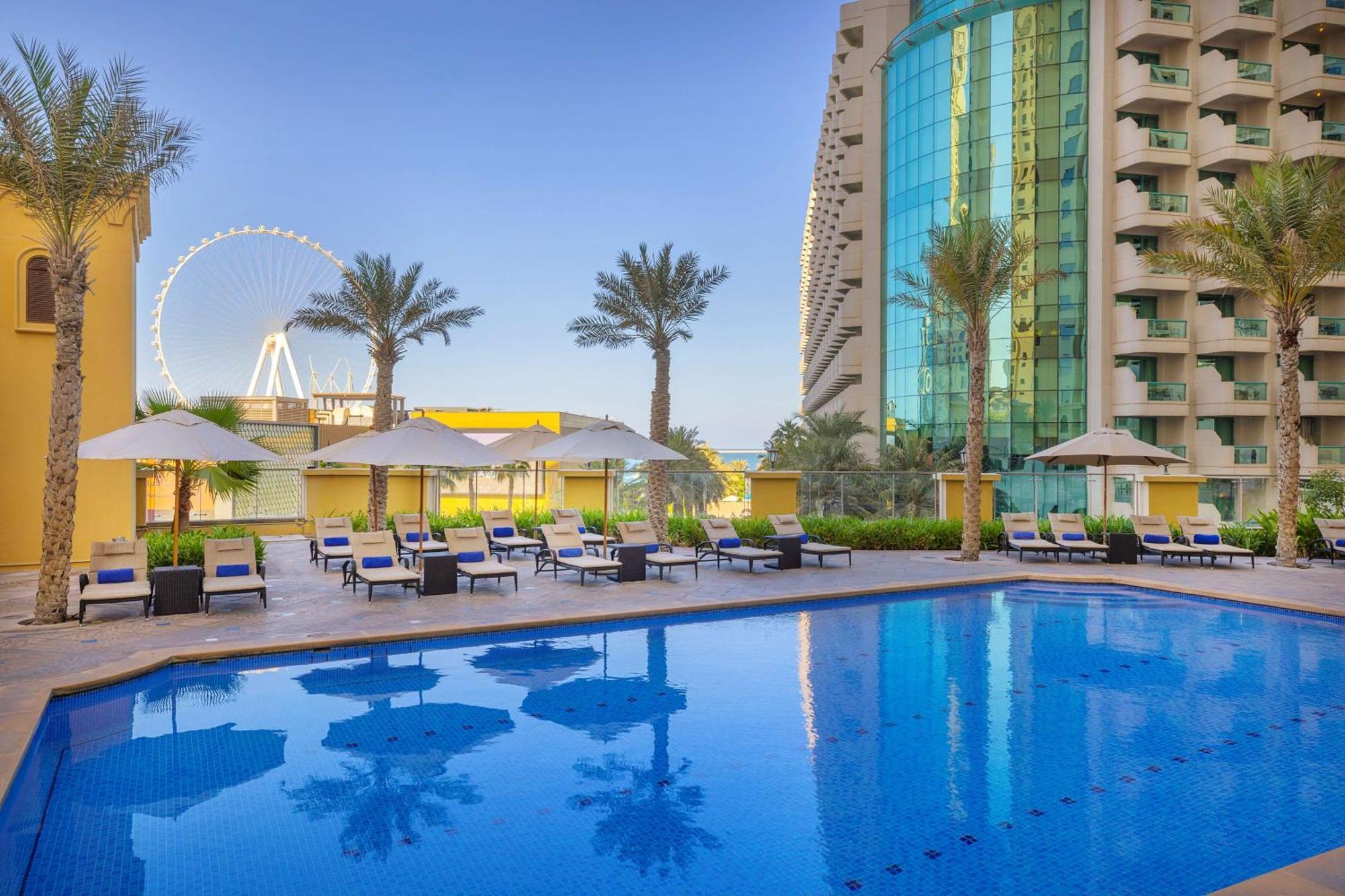 Hilton Dubai The Walk Hotell Exteriör bild