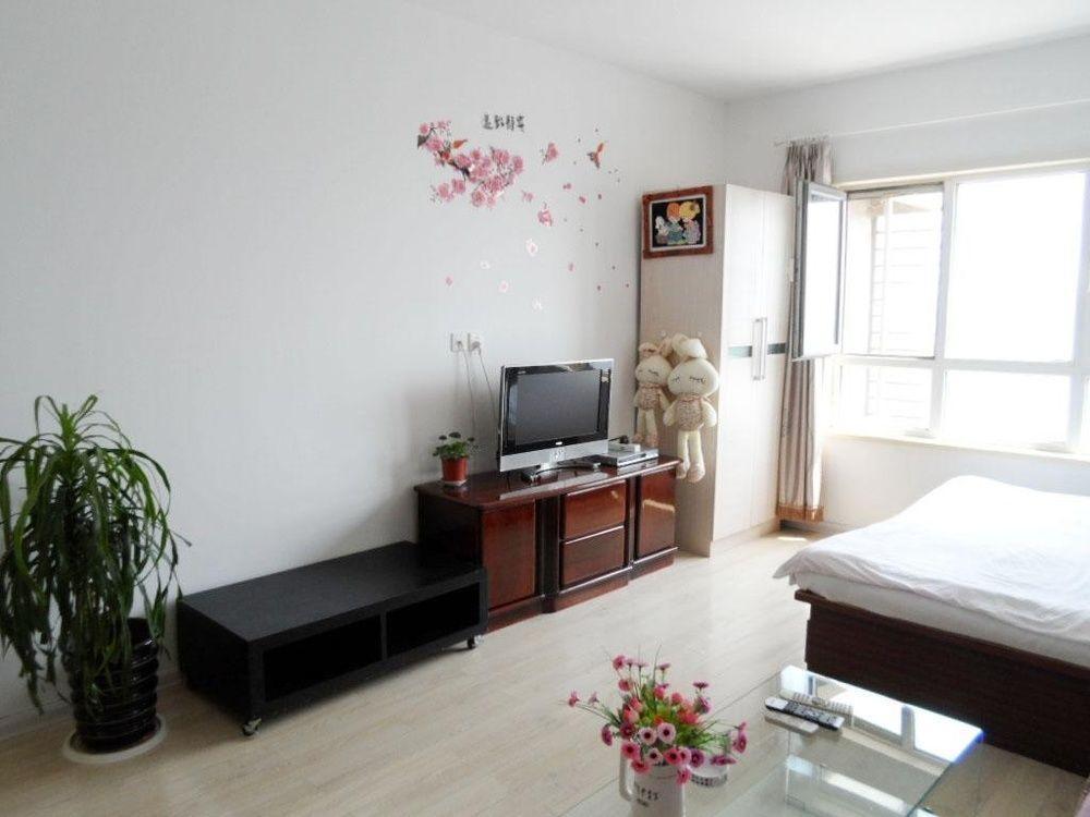 Dalian Jiujiuyuan Apartment Hotel Exteriör bild