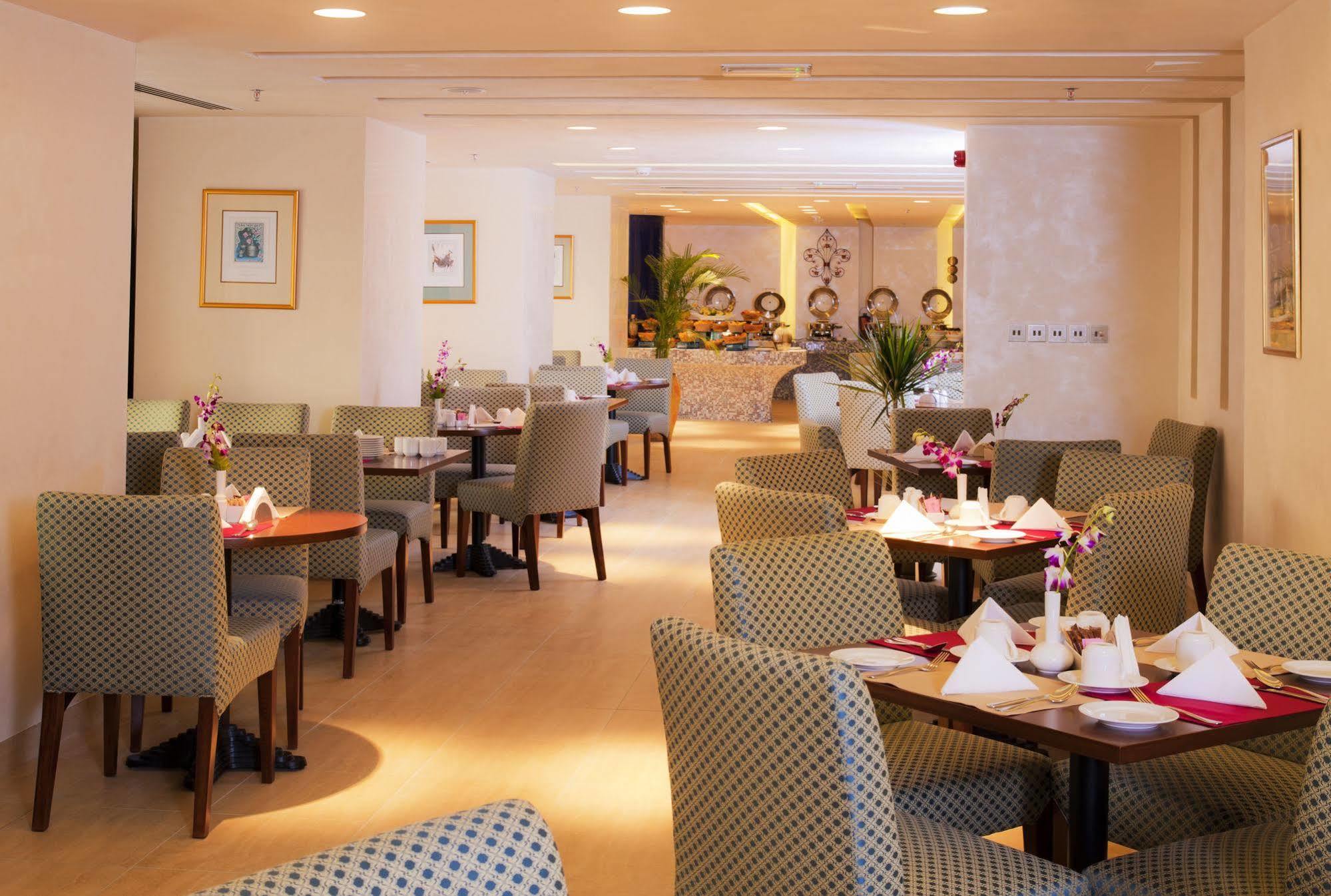 City Seasons Al Hamra Hotel Abu Dhabi Restaurang bild